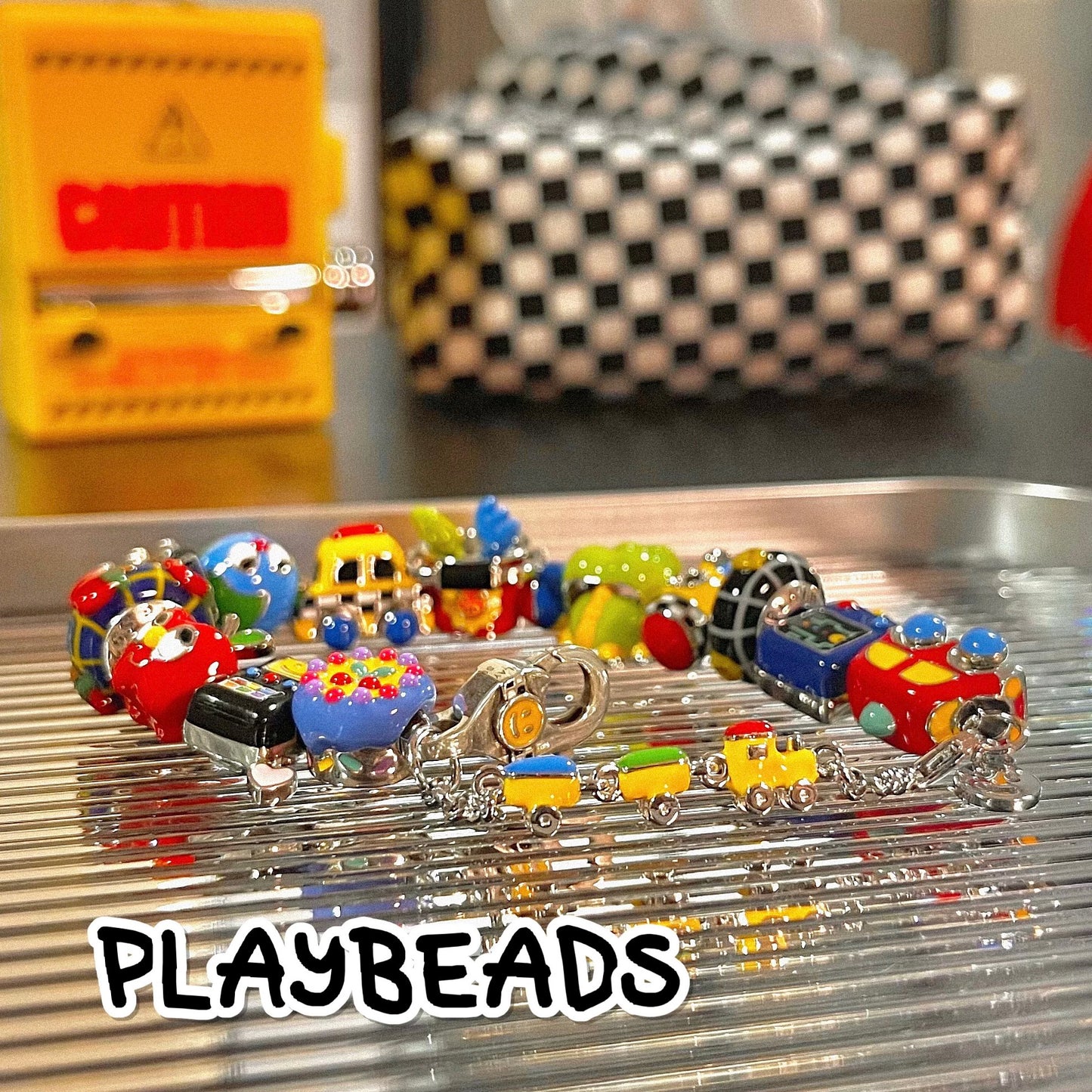 Train-PLAYBEADS